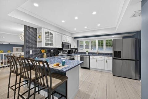 Open concept fully equipped kitchen.