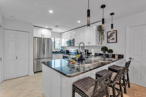 Island seating for 3 for serving a quick breakfast or lunch or just enjoying a drink!