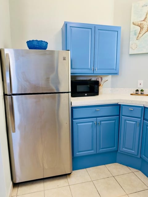 Full size refrigerator and freezer, coffee maker & Keurig too.