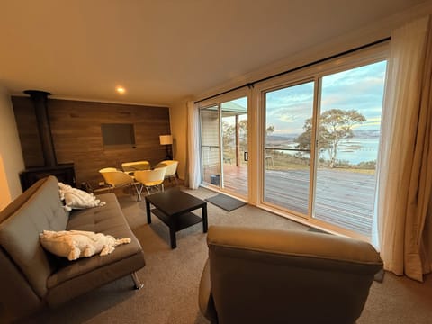 Living area with lake and mountain views