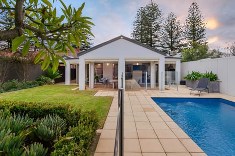 Private and secure, the rear garden and pool area is just bliss