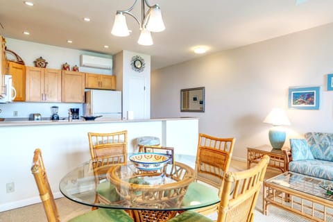 Enjoy indoor-outdoor living with this open dining space, offering seating for six and easy access to both the kitchen and the lanai. NAP-B43