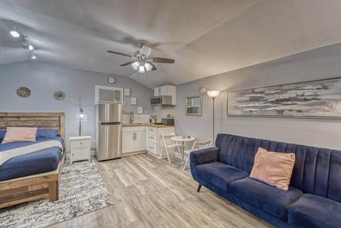 Included private secondary suite with a full-sized bed, Kitchenette, dining area, couch and full bathroom.