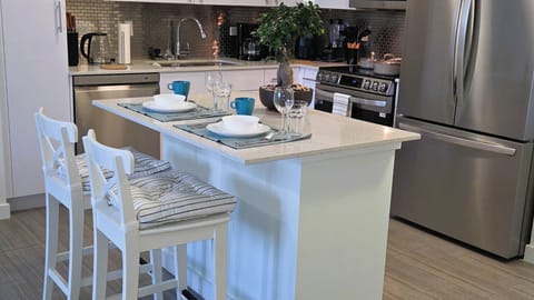 Our cozy kitchen with island, perfect for morning coffee and shared meals