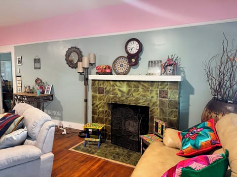 Our home is full of warm colorful art and antiques. 