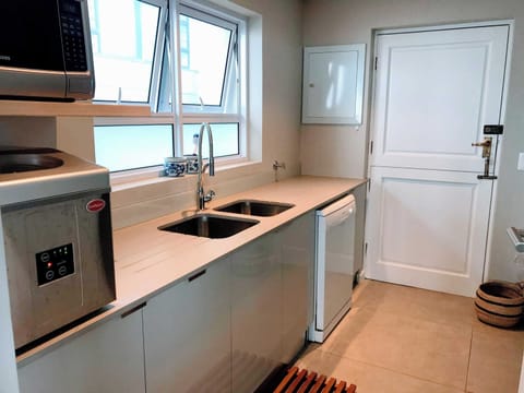 Scullery with dish washer and ice maker