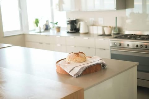 The Kitchen has a bean-to-cup machine, gas stove and fully equipped for cooking for large families