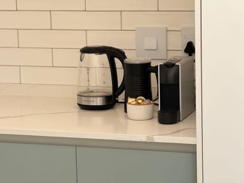 Tea kettle, Nespresso coffee machine and frother