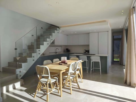 Dining and Kitchen with stairs to first floor