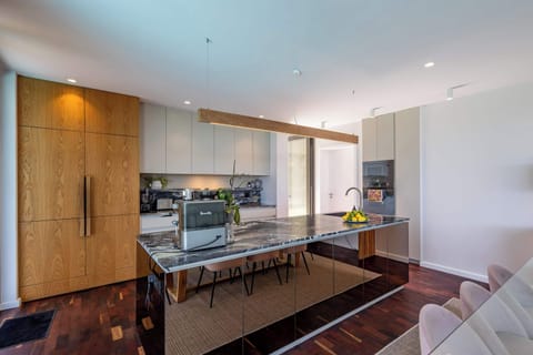 Kitchen includes bean to cup espresso machine, gas stove and all modern appliances