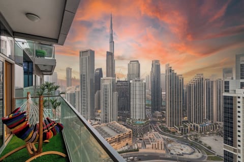 Private balcony with stunning Burj Khalifa view, perfect for relaxing moments.