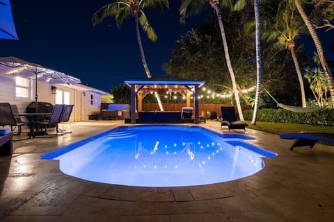 Relax and gaze at the stars with this heated multi-color salt water pool