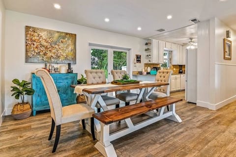 Dining area, complete with a charming farmhouse table that comfortably seats 6