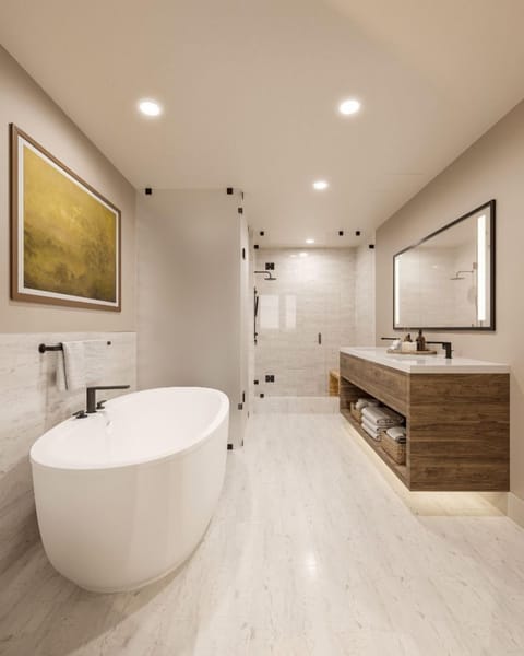 Bright, modern bathroom with calming details that set the scene for unwinding in pure comfort.