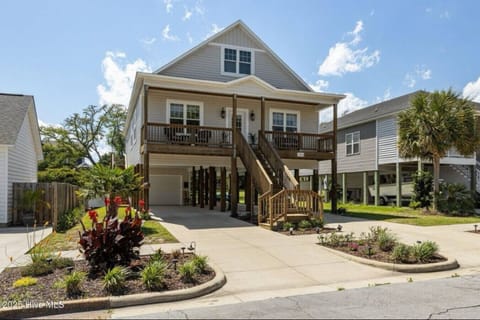 Private driveway w/ 2 carports under our home. Quiet front porch.