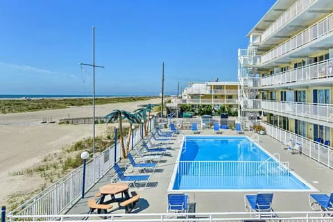Heated pool is right along the beach ... no road to cross!