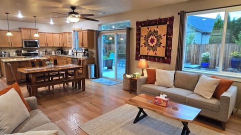 Connecting kitchen, dining & living rooms makes it a great place to host!