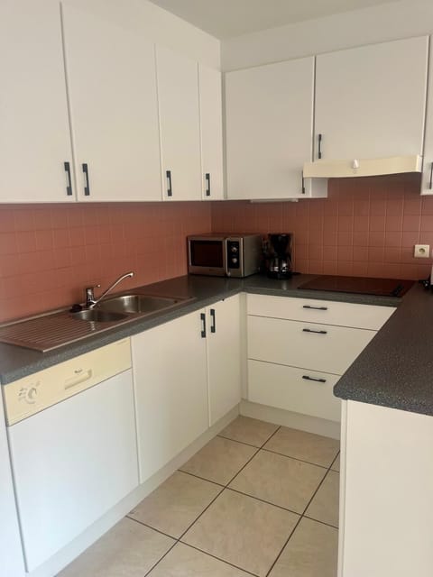 Fully Equipped Kitchen for Home Cooking
