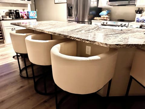 Beautiful eat-in kitchen area with extra seats at the island