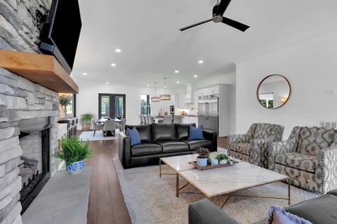 Experience stylish comfort with a sleek fireplace and vibrant views!