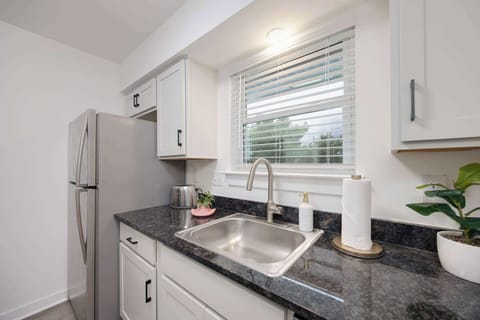 Kitchen Haven: Modern appliances and sleek counters, perfect for culinary adventures!