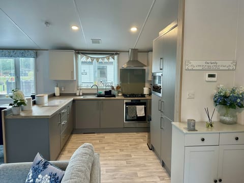 Kitchen area there is a separate utility room with washing machine & sink 