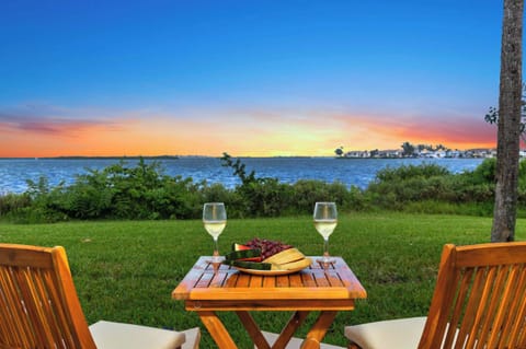 Dolphins, sunrises, and fun all from your personal patio!  Gather ‘Round – Comfortable haven with Direct Patio Access in Runaway Bay
