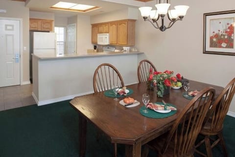 Share meals and conversation around a generously sized dining table.