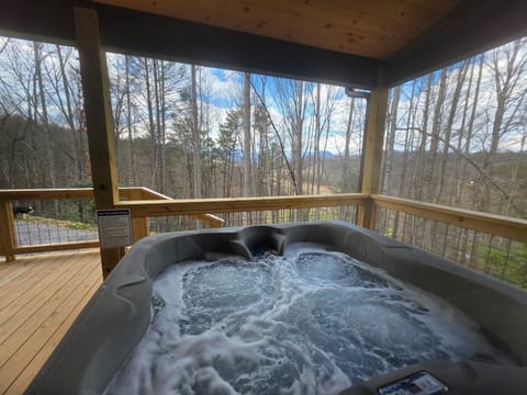 4 person hot tub on the covered porch.