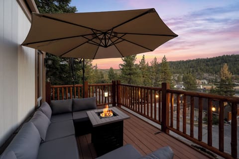 Upper Deck - Upper Deck with lake views, outdoor seating, comfy outdoor couch, gas fire pit, Retractable Awning, and propane BBQ
