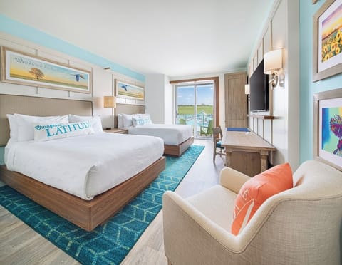 Stretch out with two plush beds and cheerful coastal style.