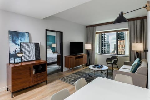 Gather for drinks and movies in this airy living space