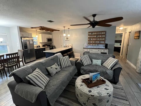 Living Room View where you can see the second bathroom and bedroom down the hall