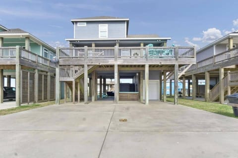 Elevated for the views, this coastal haven stands on stilts, merging breezy beach vibes with the comfort of home, where every day feels like a vacation.