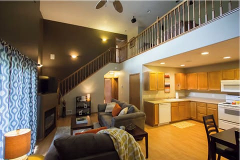 View of living room with fireplace.
