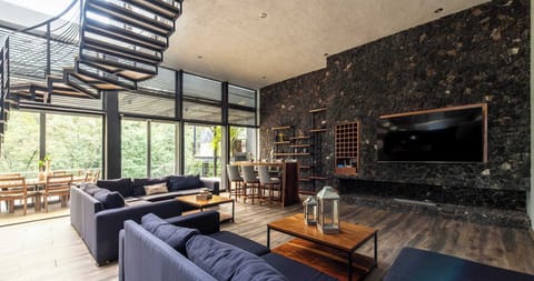 Living room and working area with access to balcony