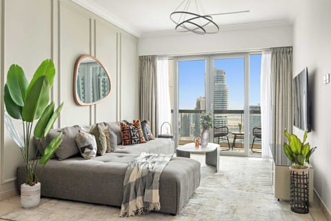 Bright living area w/ comfy seating & soft natural light