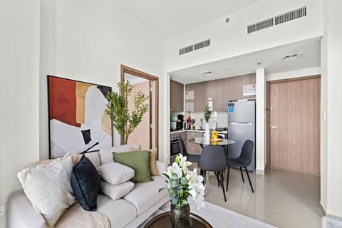 Bright living room w/ cozy seating & soft natural light