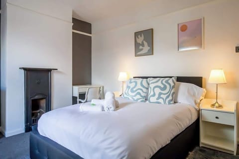 “Second bedroom — features a workspace and plenty of room to relax and recharge.”