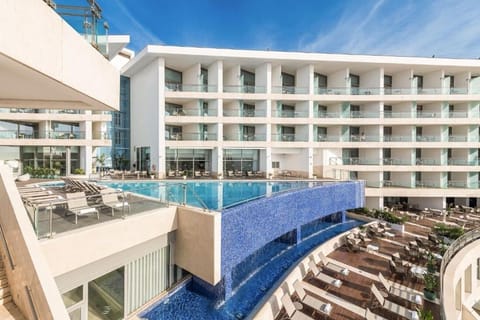 Marvel at the sweeping pool terrace designed for all-day relaxation.