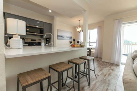 Seating for four at the bar area.