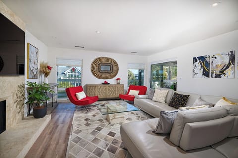 Family/Living Room with full pocket sliding door to the outdoor living space. 