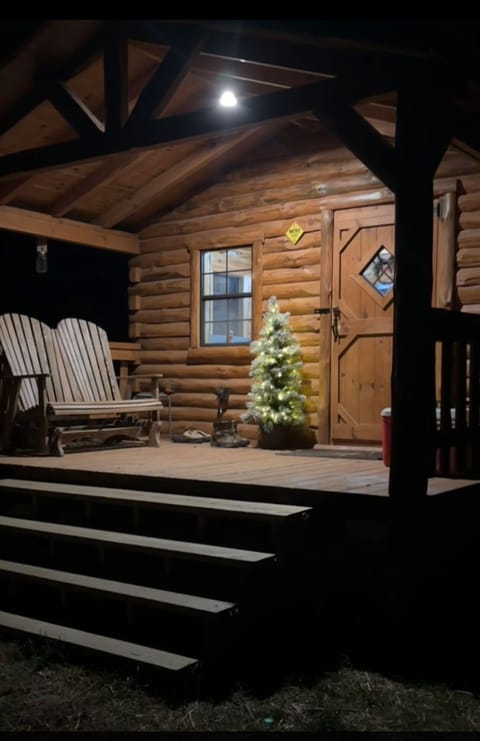 	“A welcoming porch dressed for the holidays at Haan Hollow.”