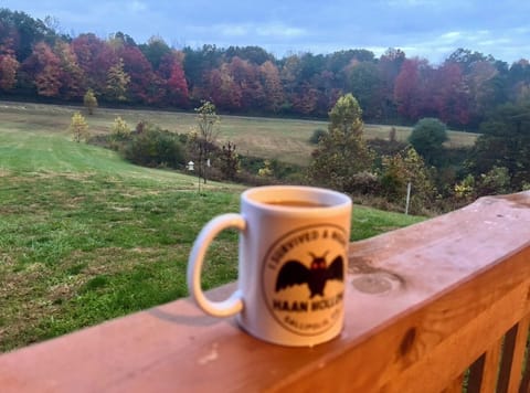 Have coffee on the front porch overlooking beautiful views. Coffee bar stocked.