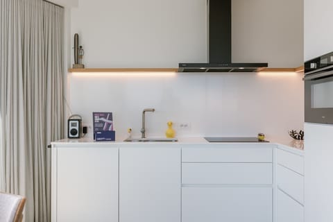 Open-plan kitchen with sleek design