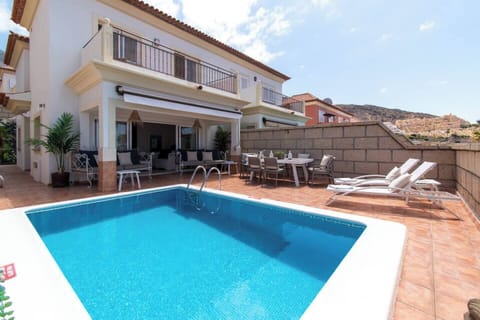 View of villa and private heated pool