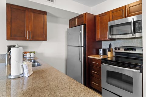 Cook together with stainless appliances and plenty of counter space.
