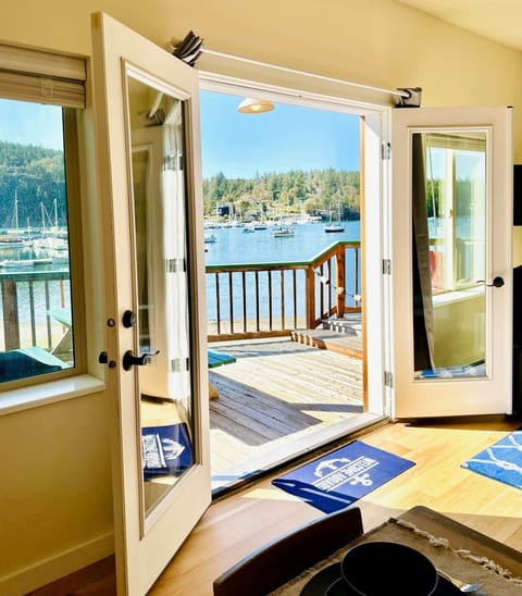 Living area view near public beach & marina; limited kayak rentals.