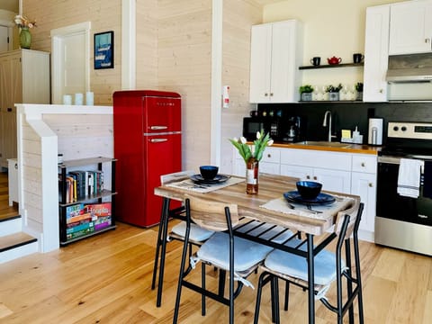 Fully equipped kitchen, dinning table for two with marina views. 