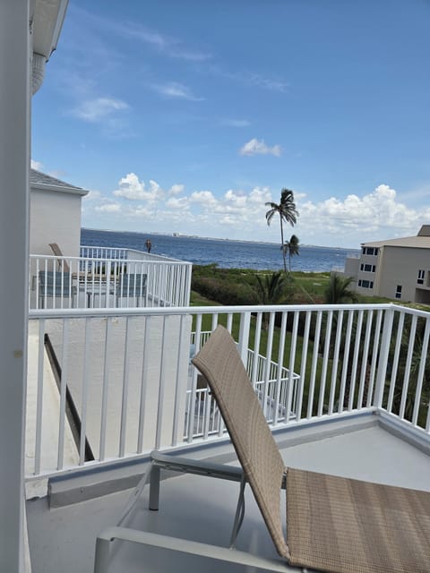Beautiful Bay view from the outdoor patio.  Enjoy the lounge chairs.
